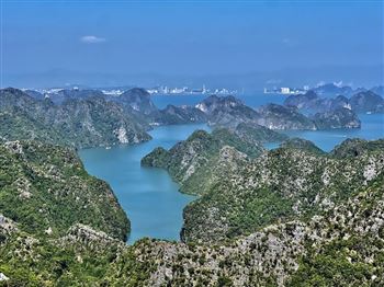 a day and night from sunset on Lan Ha Bay to Viet Hai village then climb up to Navy peak to view Ha Long Bay